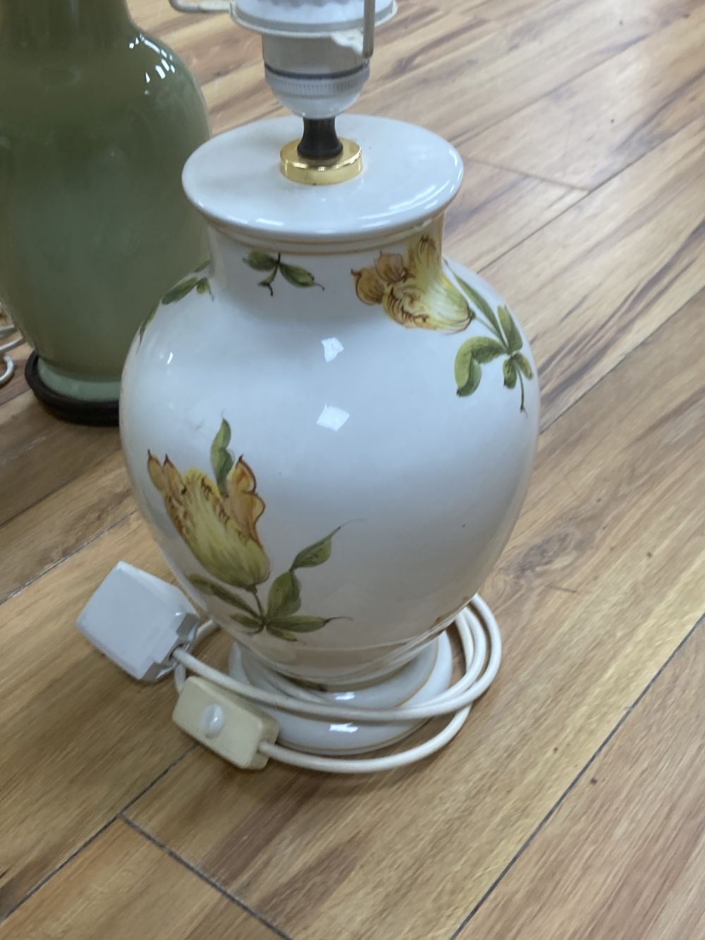 A pair lime-green glazed table lamps, 38cm, one with shade and one other earthenware lamp